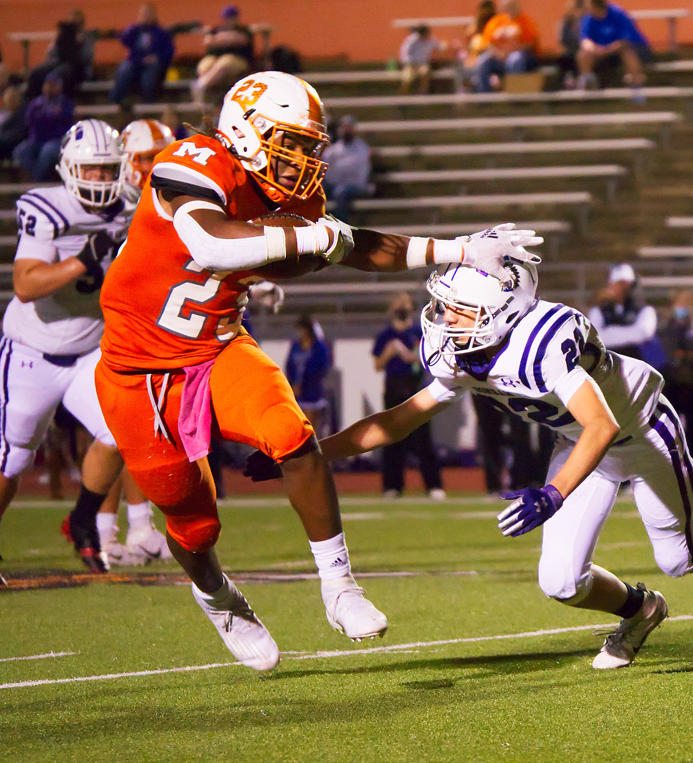 Trevion Sneed of Mineola avoids a would-be tackler in the game against Bonham. (Monitor photo by Sam Major)